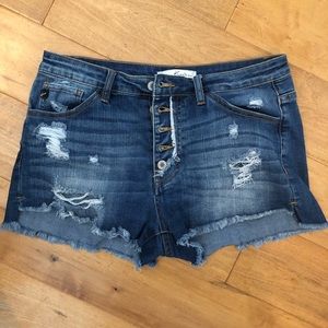 Distressed denim shorts